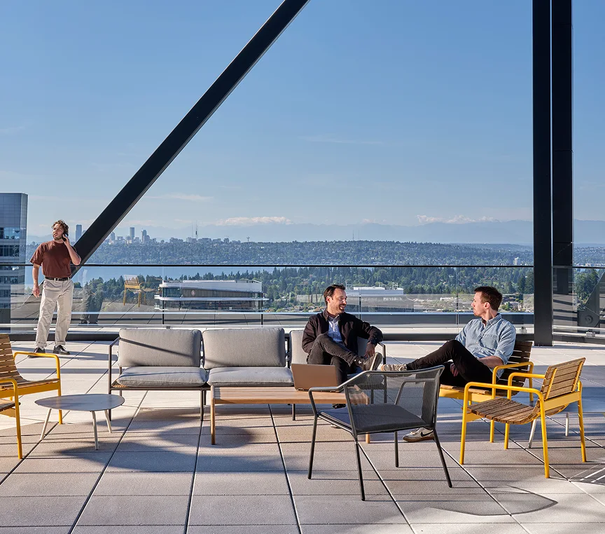 Seating area on a building roof, reflecting the dynamic and creative vibe. Seating area on a building roof, reflecting the dynamic and creative vibe.