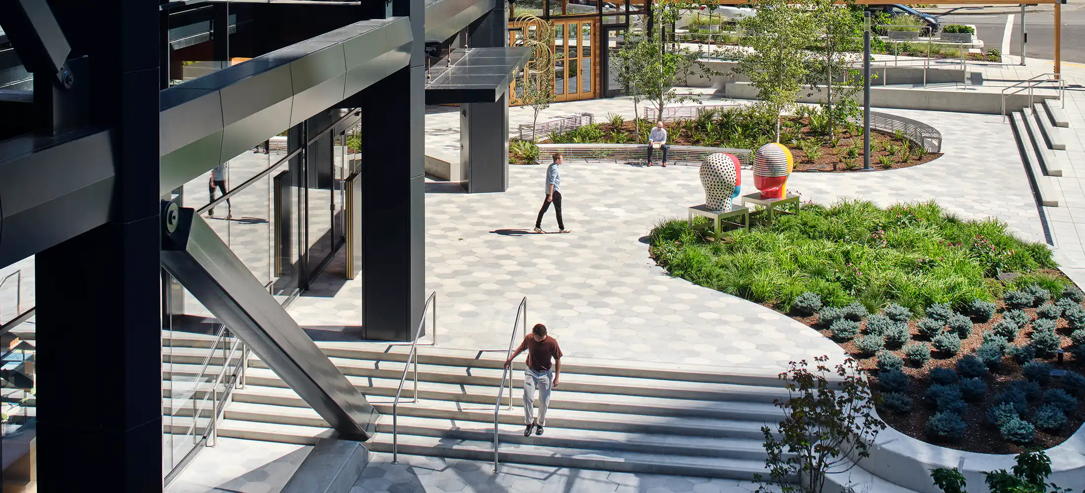 Energetic community engaging in play, growth, and connection in a beautifully designed space.